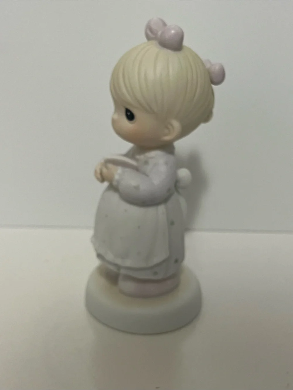 Precious Moments figurine “The Good Lord Always Delivers” from 1989